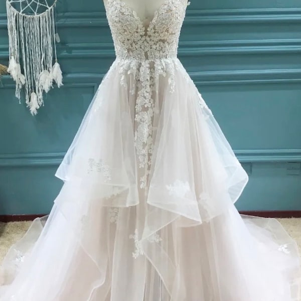 Tulle and lace ballgown with horsehair ruffles