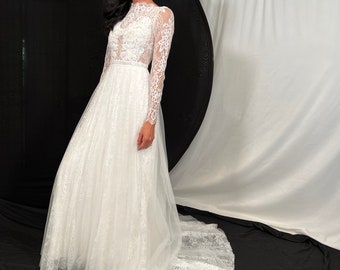 Romantic soft lace and net wedding dress