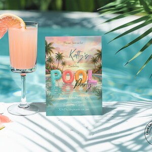 May include: A refreshing pink cocktail in a tall glass with a grapefruit slice, next to a pool party invitation. The invitation features a pool scene with the words "Pool Party" in colorful inflatable letters. Palm trees and a sunset sky are in the background.