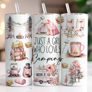 May include: Three stainless steel tumblers with pink and white watercolour designs featuring camping and outdoor themes. The tumblers have lids and straws. The centre tumbler has the text "Just a girl who loves camping".