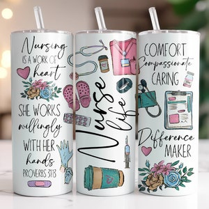 May include: Three white tumblers with colorful designs and inspirational quotes related to nursing. The tumblers feature images of medical equipment, flowers, and hearts. The text on the tumblers includes "Nursing is a work of heart", "Comfort Compassionate Caring", and "Difference Maker".