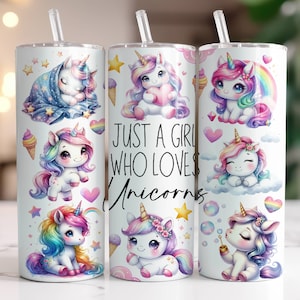 May include: Three white stainless steel tumblers with a unicorn theme. The tumblers feature colorful illustrations of unicorns, rainbows, and stars. The middle tumbler has the text "Just a girl who loves unicorns".