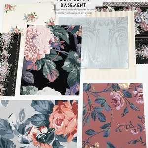 May include: An assortment of vintage wallpaper samples featuring floral patterns in various colours, including pink, blue, green, and black. The samples are arranged on a white surface. The text "FROM BETH'S BASEMENT" is visible at the top of the image.
