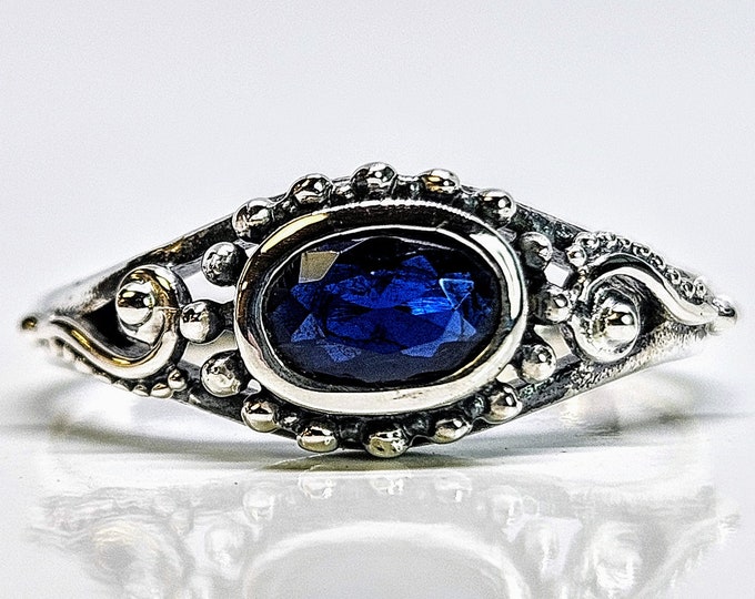 Designed Sterling Silver Ring Featuring Blue Oval Cut Imitation Sapphire