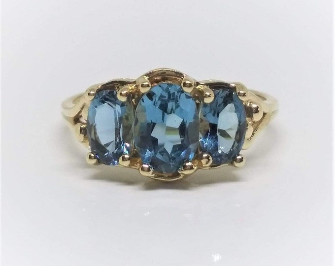 10k Yellow Gold Oval Blue Topaz Ring