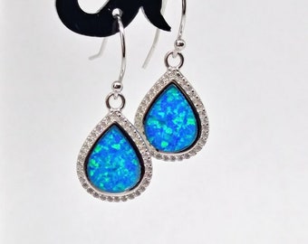 Sterling silver blue opal halo earrings
