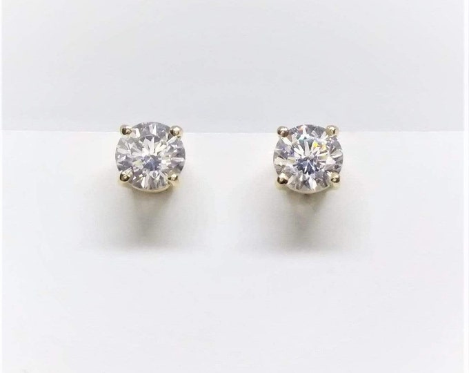 0.60 TCW SI 14k Yellow Gold Diamond Stud Earrings