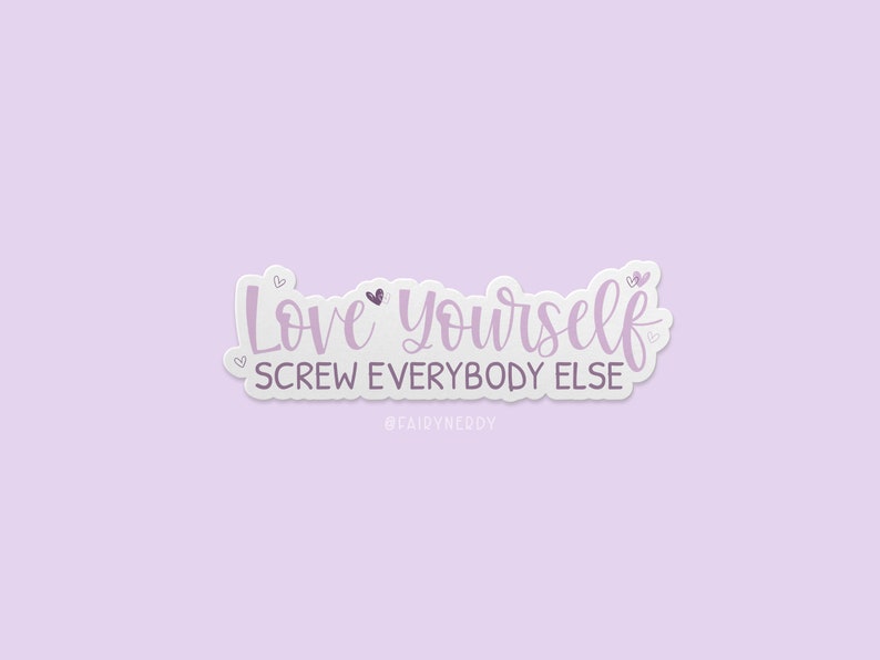 A stack of vinyl die cut sticker with purple text reading, "Love Yourself. Screw Everybody Else."