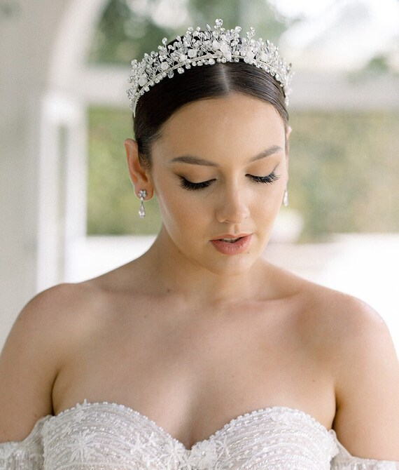 Luxury wedding crown diadem on bride's head hairstyle. morning wedding  preparation bride with crown close up Stock Photo | Adobe Stock