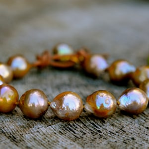 Golden Baroque Pearl Bracelet: Unisex Leather Closure