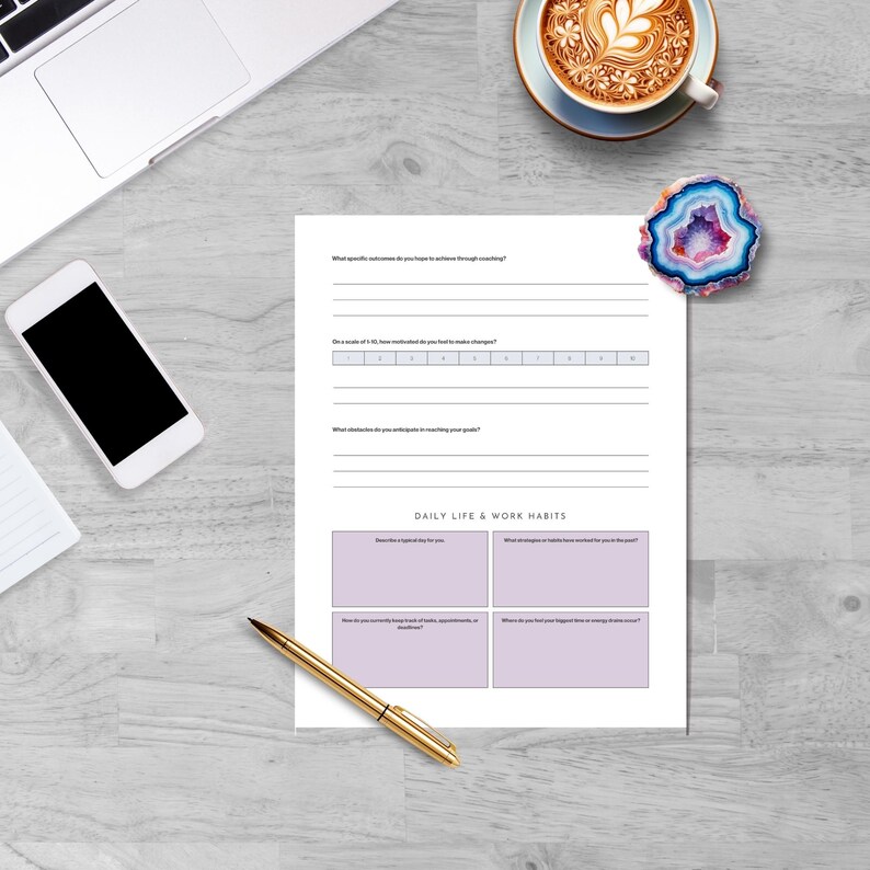 May include: A workspace scene with a white laptop, smartphone, and a planner with the text "DAILY LIFE & WORK HABITS." A gold pen, a coffee cup with latte art, and a decorative geode are also present.