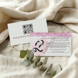 May include: Pink and white business card with a black snake design. The card reads "Soul Journey Intuitive Readings by Jennifer Standley" and includes a website address and a discount offer.
