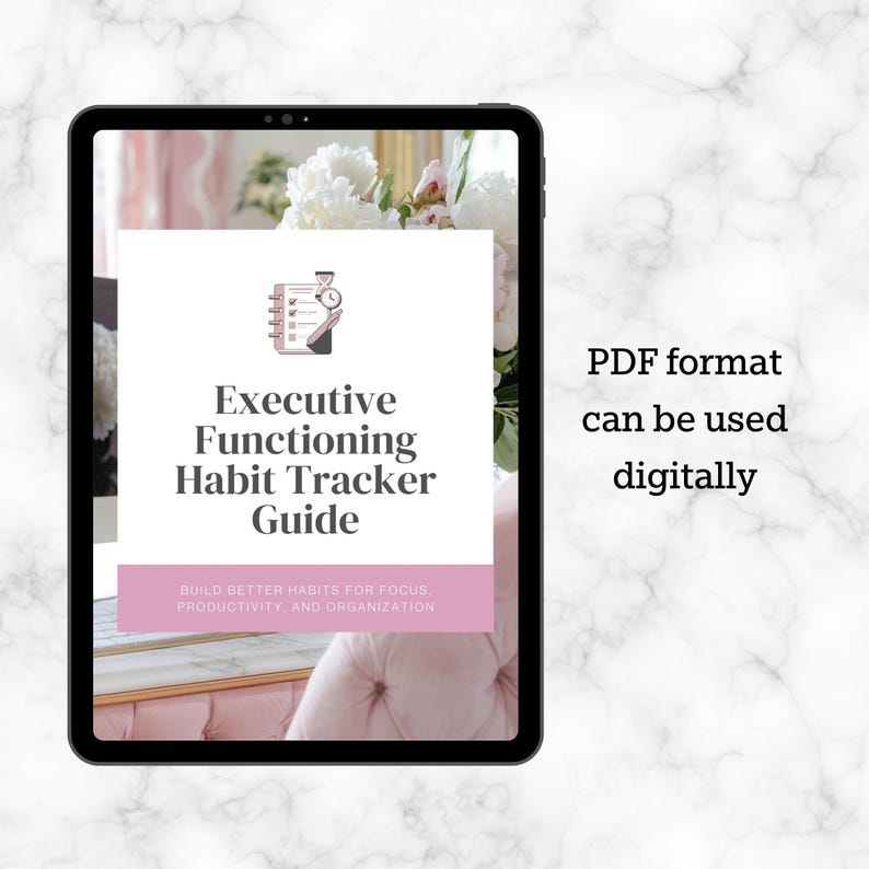 May include: A digital tablet displays a white and pink habit tracker guide. The guide's title is "Executive Functioning Habit Tracker Guide." Text on the right side reads "PDF format can be used digitally." The background is a marble pattern.