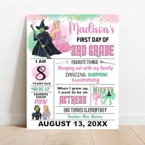May include: A personalized pink and white 3rd grade first day of school sign. The sign includes the child's name, age, height, weight, favorite color, and favorite things. The sign also features illustrations of characters from the musical "Wicked".