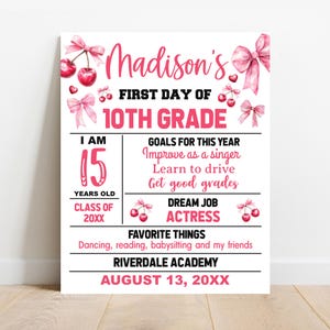 May include: A pink and white personalized sign for the first day of 10th grade. The sign includes the name "Madison's", age 15, goals for the year, dream job "ACTRESS", favorite things, and the school name and date.