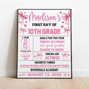 May include: A rectangular sign titled Madison's First Day of 10th Grade, decorated with pink bows and hearts. It includes sections for age 15, goals like learning to drive, dream job as an actress, favorite things, and Riverdale Academy details.