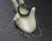 1904-64 - Polished Translucent Jadeite Ring With Black Leather Cord - Thumb Ring - Jade Stone - Gamble Stone - Size 11 (20.3mm)