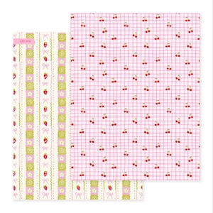 May include: Two sheets of patterned paper. One sheet has a pink gingham pattern with red cherries. The other sheet has vertical stripes with strawberries, bows, and flowers in pink, green, and white. The text "C25-014" is visible.