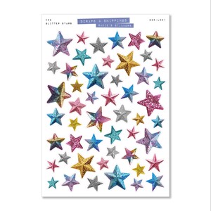 May include: A sheet of glitter star stickers in various sizes and colors, including gold, pink, blue, silver, and iridescent. The sheet has the text "#02 Glitter Stars" and "Scraps & Snippings Sadie's Stickers".