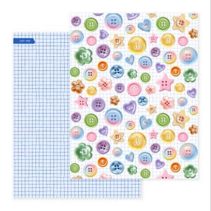 May include: Two sheets of paper. One sheet has a blue grid pattern. The other sheet is covered in colorful button illustrations in various shapes and sizes, including round, star, heart, and flower shapes. The buttons are in shades of pink, yellow, green, blue, and orange.