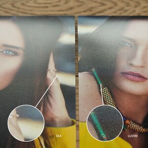 May include: Close-up comparison of two photo paper finishes: Silk and Lustre. The Silk finish has a subtle texture, while the Lustre finish has a more pronounced texture.