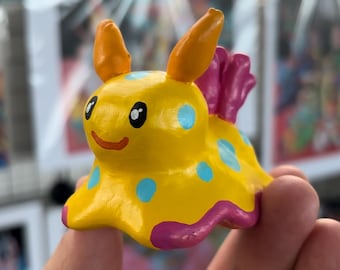 sea slug toy, sculpture, nudibranch artwork, art sculpture, art figure, sea slug figure, fine art, small animal figure