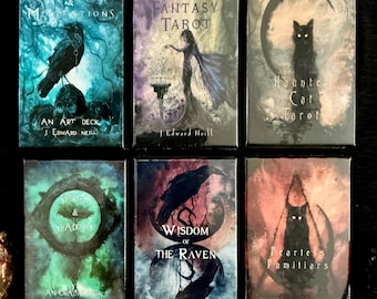 May include: Six rectangular tarot and oracle card decks by J. Edward Neill. Titles include Myths & Meditations, Dark Fantasy Tarot, Haunted Cat Tarot, Spirits & Shadows, Wisdom of the Raven, and Fearless Familiars, featuring dark, atmospheric illustrations.