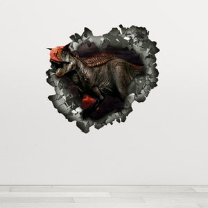 May include: A large, grey dinosaur with red accents bursts through a cracked wall. The dinosaur is facing left and has a fierce expression. The wall is made of grey stone and is cracked and broken. The background is dark and blurry.