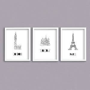 May include: Three black and white illustrations of famous landmarks. The first illustration is of Big Ben in London, the second is of St. Basil's Cathedral in Moscow, and the third is of the Eiffel Tower in Paris.