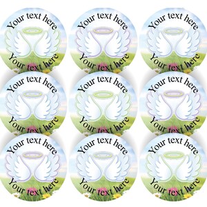 May include: Nine round stickers featuring a white angel wing design on a blue and green background. The text "Your text here" is written around the edge of each sticker.