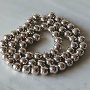 Add a bead necklace 80s deals