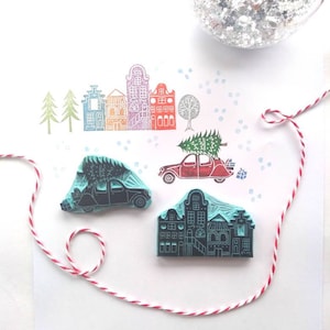 Christmas car and houses rubber stamps for festive decor.