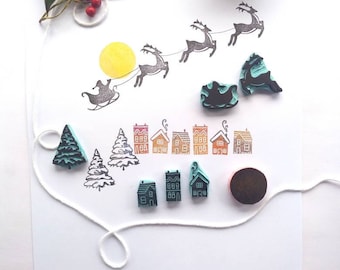 Santa sleigh and reindeer rubber stamp set.