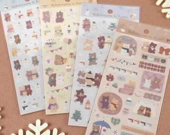 May include: Four sheets of clear sticker paper with winter-themed illustrations of bears, snowmen, and other wintery scenes. The stickers are printed with the text "Yukidaruma to Kuma" on each sheet.