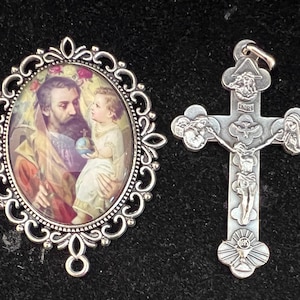 This is an XL Silver Oval Saint Joseph Rosary Center with a Silver Holy Trinity Cross