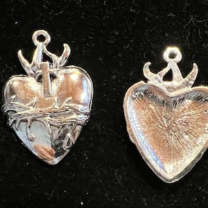 Two pieces of this beautiful Sacred Heart of Jesus charm, Mexican Milagro Flaming Heart pendant, silver tone.