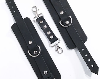 Black leather handcuffs / anklets