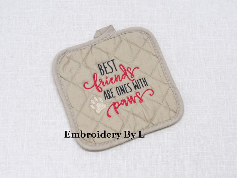embroidered pot holder. Best friends are ones with paws