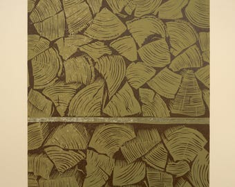 May include: A woodblock print of a stacked woodpile, with a gold metallic line separating the two sections. The print is in shades of brown and green, and is signed "M. Stein" in the lower right corner. The print is numbered "5/16" in the lower left corner.