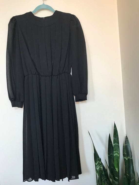 black pleated midi dress