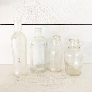 Collection of 4 Small Clear Glass Bottles/Farmhouse Kitchen Collection of 4 Small Clear Vintage Glass Bottles/Shabby Chic Bottle Collection