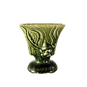 May include: A rustic wooden sign with the text "Welcome to our home" in white lettering. The sign features a distressed finish and a simple, inviting design, perfect for a front porch or entryway.