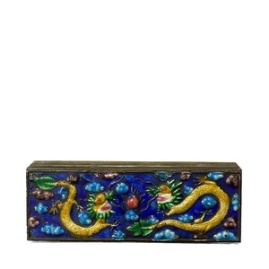 May include: A small rectangular box with a blue enamel background and gold dragons. The dragons are intertwined and have colorful accents. The box is made of metal.