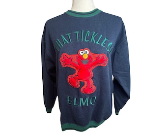 Sudadera verde y azul marino con parche bordado de Barrio Sésamo de los 90 que hace cosquillas a Elmo, talla M