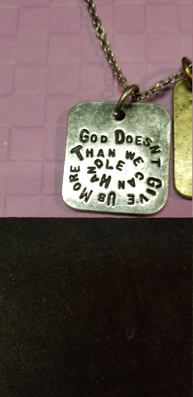 necklace Silver chain with dangle silver and bronze tags with words ORIS