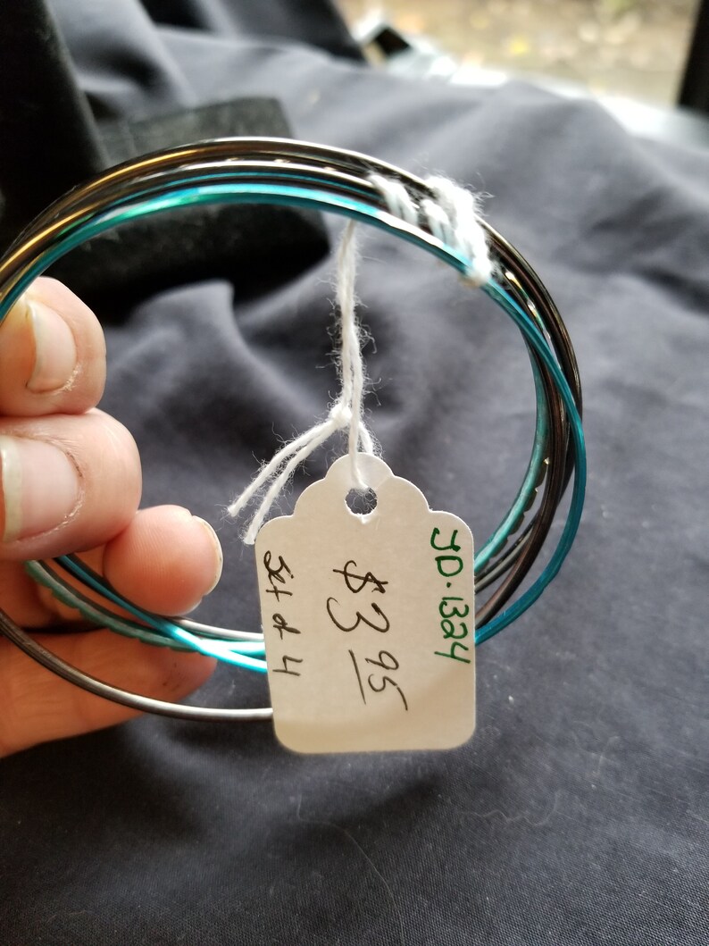 set of four blue and brown bangle Bracelets