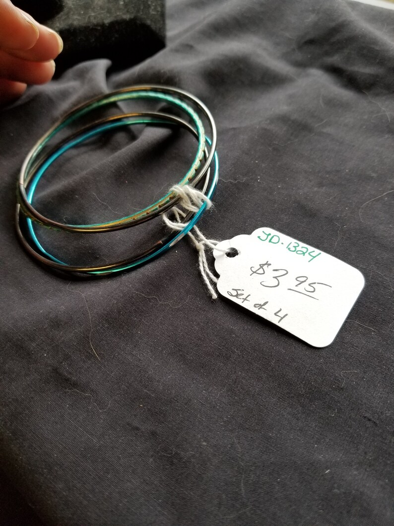 set of four blue and brown bangle Bracelets