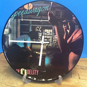 REO Speedwagon Album Rock Clock