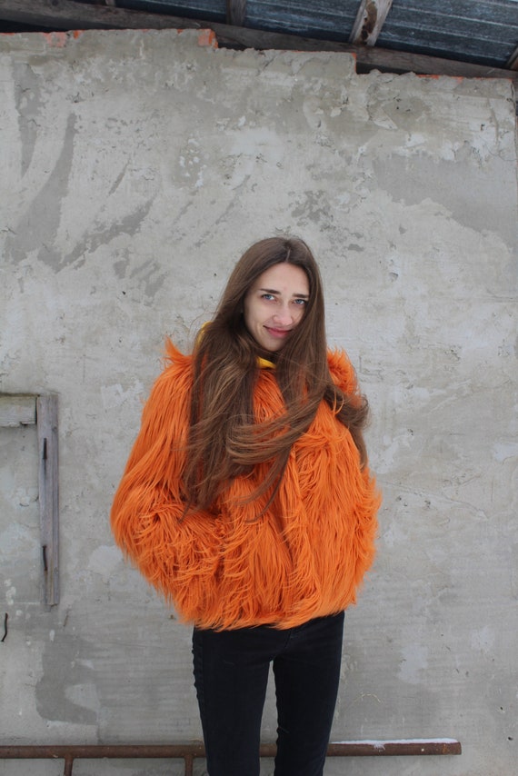 orange shaggy jacket