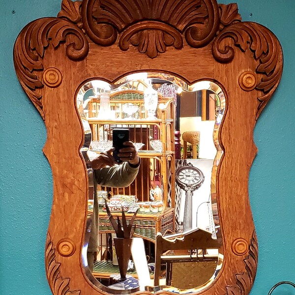 Antique oak carved beveled glass Hall Mirror.